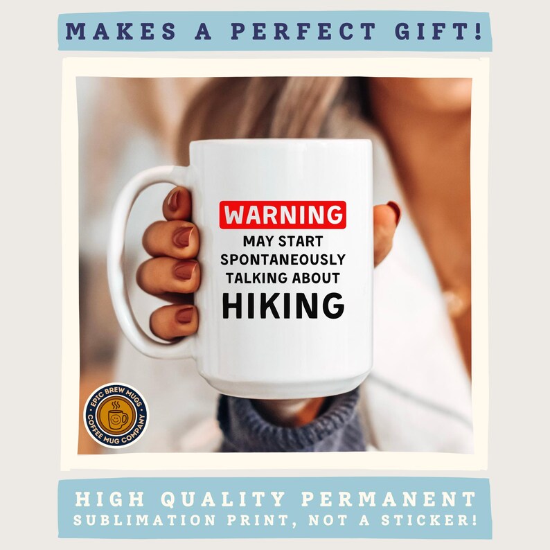May include: White ceramic mug with the text "WARNING MAY START SPONTANEOUSLY TALKING ABOUT HIKING" in black and red. The mug has a large handle and a logo that says "Epic Brew Hugs Coffee Mug Company".