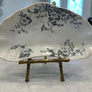 May include: A rustic wooden sign with the text "Welcome to our home" in white lettering. The sign features a distressed finish and a simple, inviting design, perfect for front door decor.