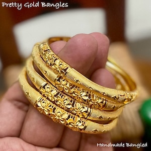 Gold bangles dubai designs clearance