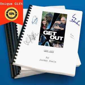 May include: A white bound script for the movie "Get Out" by Jordan Peele. The cover features a photo of the film's cast and the title "Get Out" in large, bold letters. The script is signed by the cast members.