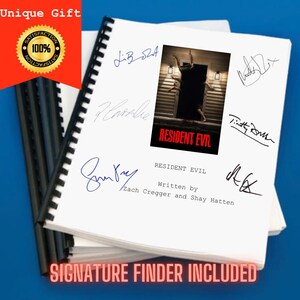 May include: A spiral-bound script for the movie Resident Evil, featuring a central poster image, the title Resident Evil, and the text Written by Zach Cregger and Shay Hatten. The white cover includes several ink signatures in blue and black.