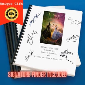 May include: A stack of white paper pages bound with a black plastic comb binding. The pages feature the text "WICKED: FOR GOOD" and signatures. A small image from the musical is in the center. The words "Unique Gift" and "Signature Finder Included" are also visible.