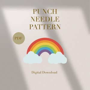 May include: A digital download PDF pattern for a rainbow punch needle project. The pattern features a rainbow with clouds and the text "Punch Needle Pattern" and "PDF" in gold.