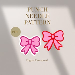 May include: A digital download PDF pattern for a punch needle bow. The pattern includes two bows, one in pink and red and the other in pink and white.