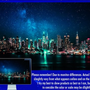 May include: A digital art print depicting a city skyline at night under a starry sky. The city lights reflect in the water. A computer monitor shows the same image. Text on the image warns of potential colour variations due to monitor differences.