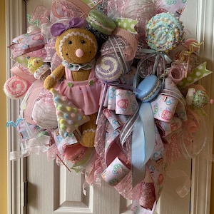 Pastel gingerbread Christmas wreath, pink blue candy land, gingerbread boy, gingerbread girl, pastel Christmas