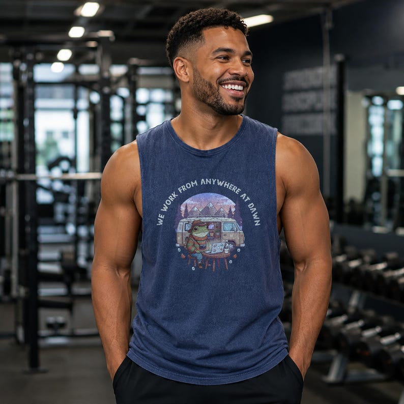 Men's dark blue sleeveless t-shirt with a graphic of a frog working on a laptop in front of a van.