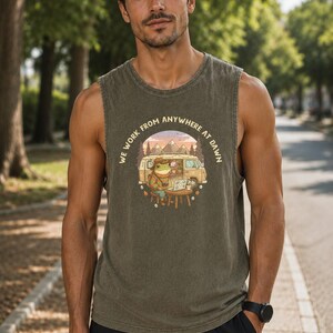 Green tank top with "We Work From Anywhere At Dawn" graphic of a frog with a laptop by a van.