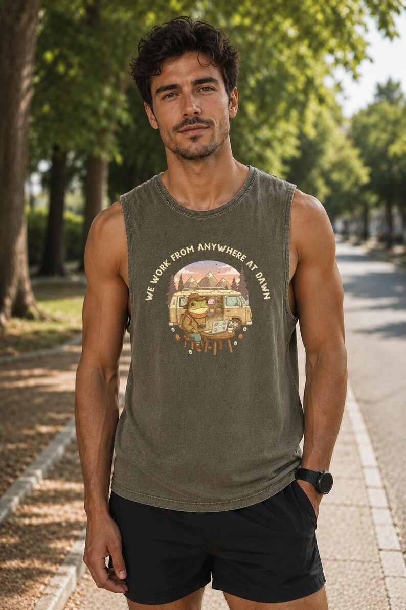 Green tank top with "We Work From Anywhere At Dawn" graphic of a frog with a laptop by a van.
