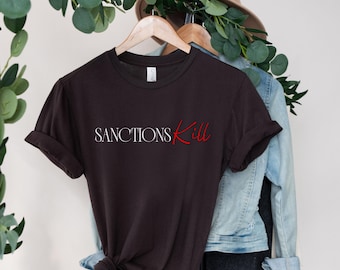 Camiseta "Sanções Matam" | Camiseta com Declaração Anti-Guerra | Camiseta de Ativista de Direitos Humanos | Vestuário Anti-Imperialismo | Paz, Não Guerra | Camiseta da Compaixão