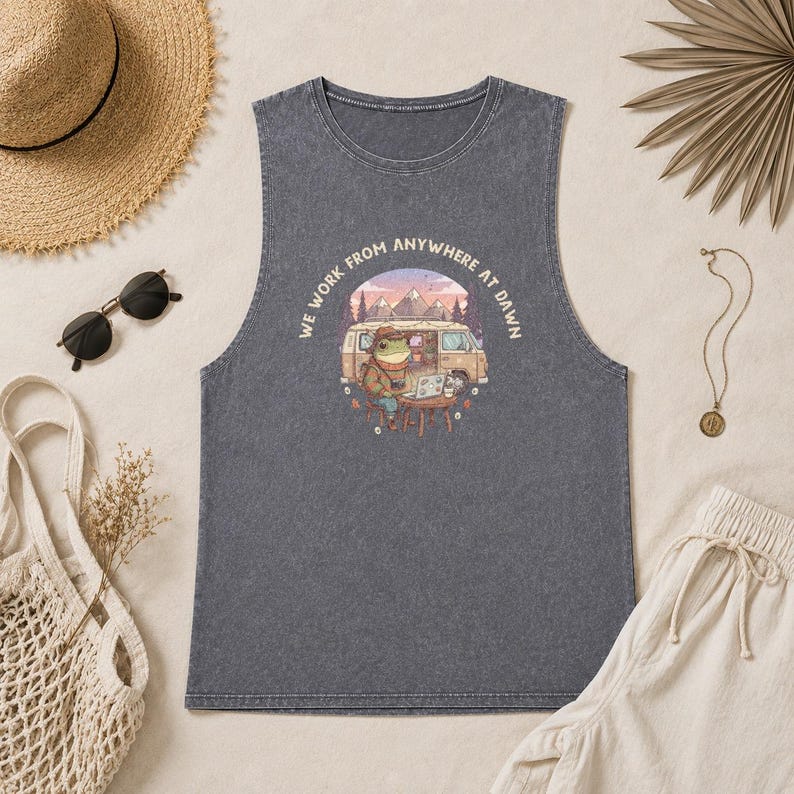 Tank top with frog working on laptop near van, "We Work From Anywhere At Dawn" text.