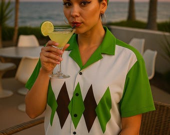 May include: A retro-style button-up shirt with a white base, green collar and sleeves, and a brown and green diamond pattern. The shirt is paired with a green headscarf. A cocktail with a lime garnish is held in a martini glass.
