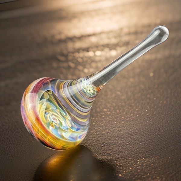 Spiral Implosion Glass Spinning Top. Each one is unique and one of a kind Collectible tops, great gifts, for play or display!