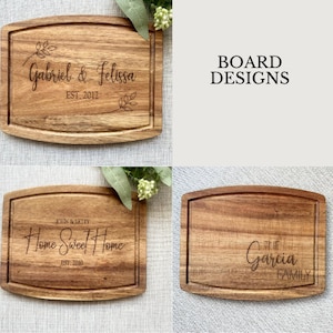 May include: Four wooden cutting boards with engraved text. The top left board says "Gabriel & Felissa EST. 2012". The top right board says "BOARD DESIGNS". The bottom left board says "JOIN & LETTY Home Sweet Home EST. 2020". The bottom right board says "The Garcia FAMILY".