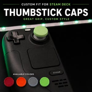 May include: A light green thumbstick cap installed on a black handheld gaming console. The image includes text reading CUSTOM FIT FOR STEAM DECK THUMBSTICK CAPS GREAT GRIP, CUSTOM STYLE and shows four available color options in red, orange, gray, and green.