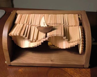 Exquisite wooden music box [Sailboat Music Box] The wooden hand-cranked music box has a sailboat moving forward in the waves.