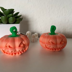 Llavero de calabaza inquieto - Lindo juguete antiestrés de Halloween - Calabaza giratoria para relajación y decoración - Colorido estampado otoñal en 3D