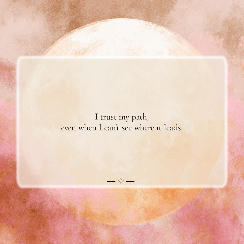 May include: A rectangular card with rounded corners featuring the text, I trust my path, even when I can't see where it leads, centered above a small star icon. The background displays a large, pale moon against a soft, watercolor-style pink and brown wash.