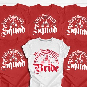 May include: Six red t-shirts with white text and a white graphic of a castle. One white t-shirt with red text and a red graphic of a castle. The text on the red shirts says "Kayla's Bachelorette Squad". The text on the white shirt says "My Bachelorette Bride".