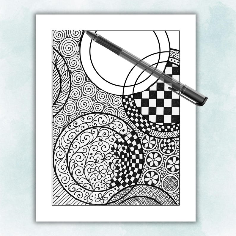May include: Detailed black and white adult colouring page featuring geometric and floral designs. A black pen is placed on the page. The patterns include circles, spirals, and a checkerboard design, offering a relaxing activity.