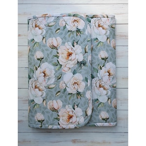 May include: A rustic wooden sign with the text "Welcome to our home" in a handwritten style. The sign has a distressed finish and a simple, inviting design, suitable for a front porch or entryway.