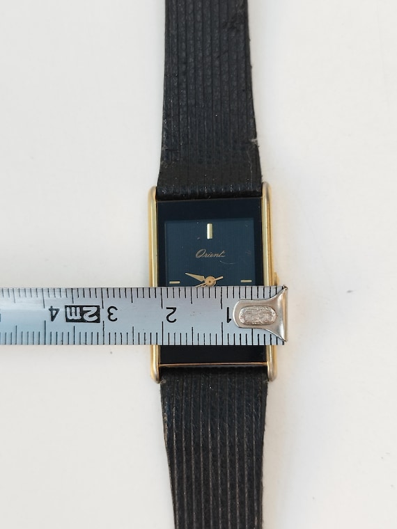 Orient Tank Rectangular Black and Gold Quartz Wat… - image 8