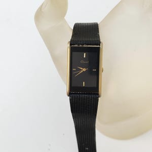 Orient Tank Rectangular Black and Gold Quartz Watch with a leather strap
