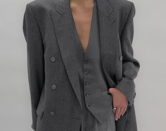 Blazer croisé à fines rayures vintage des années 90 en gris foncé.