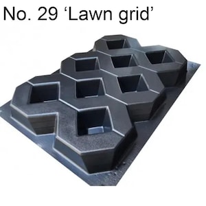 May include: A dark gray lawn grid with a honeycomb design. The grid has a series of hexagonal openings, perfect for creating a stable surface for lawns or pathways. The text "No. 29 'Lawn grid'" is at the top.