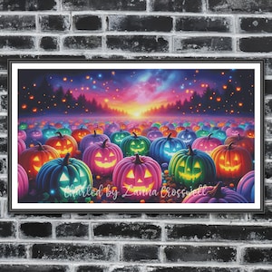 May include: A framed artwork featuring a field of glowing jack-o'-lanterns in various colors, including orange, purple, green, and blue. The background shows a colorful sunset and silhouettes of trees. The text "Charted by Zanna Crosswell" is visible.