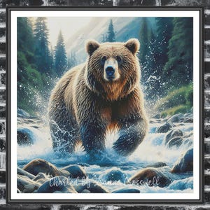 Puede incluir: Una impresión enmarcada de un oso pardo caminando por un río. El oso es el punto focal, con agua salpicando alrededor de sus patas. El fondo presenta un bosque y montañas, con el texto "Charted by Joanna Crosswell" en la parte inferior.