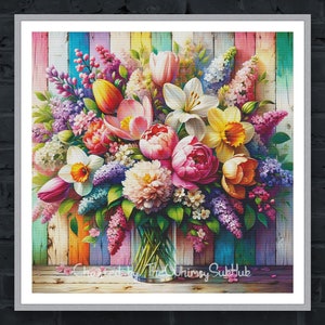 May include: A colourful bouquet of flowers in a glass vase, arranged against a backdrop of painted wooden planks. The bouquet includes pink peonies, yellow daffodils, purple lilacs, white lilies, and orange tulips.
