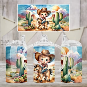 May include: A clear plastic sippy cup with a straw and two handles. The cup is decorated with a watercolor illustration of a baby cowboy riding a horse in a desert landscape with cacti.
