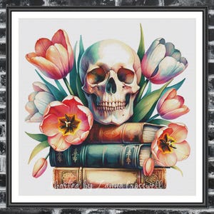 May include: A framed watercolour print depicting a human skull amidst vibrant tulips and green foliage. The skull is positioned on a stack of old books. The artwork has a gothic, floral theme.