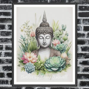 Könnte beinhalten: Gerahmter Kunstdruck eines grauen Buddha-Statuen-Porträts, umgeben von grünen Sukkulenten und rosa und blauen Blumen. Der Text "Charted by Zanna Crosswell" ist unten sichtbar.