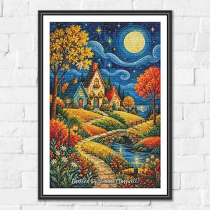 Könnte beinhalten: Ein gerahmter Wandkunstdruck mit einer lebendigen Nachtszene, Vollmond, Sternenhimmel und einer Steinbrücke über einen Bach, die zu einem Häuschen führt. Die Landschaft umfasst bunte Herbstbäume, Blumen und den Text Charted by Lanna Crosswell.