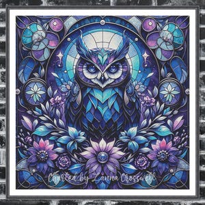 May include: Framed art print depicting an owl in a stained-glass style. The artwork uses blues, purples, and teals, with floral and geometric patterns. The text "Charted by Lanna Crosswell" is visible at the bottom.