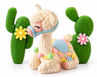 May include: A cream-colored textured llama figurine with a light blue bridle, a pastel saddle, and a colorful beaded necklace, flanked by two green cacti featuring small yellow and pink flowers, all crafted from a smooth, molded material.