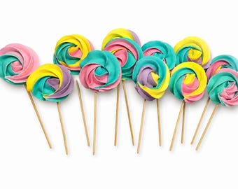 May include: A collection of twelve swirl-shaped meringue lollipops on wooden sticks. Each treat features a vibrant, multi-colored pattern of pastel pink, bright yellow, turquoise blue, and soft lavender, arranged in a tight, spiraled rosette design.