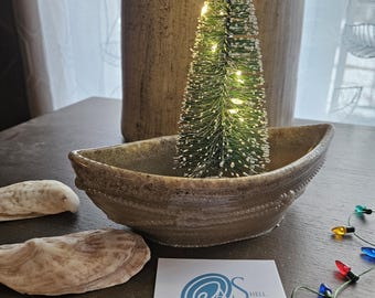 Christmas Dory-Crushed Oyster Shell Boat with White Tree Lights. Welcome to New England!