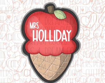 May include: A red apple ice cream cone cookie cutter with the text "Mrs. Holliday" on the apple.