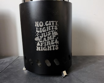 No City Lights, solo noches de fogata. Pozo de fuego estilo mesa individual de color negro.