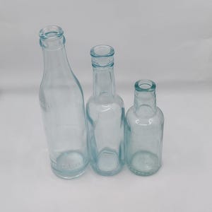 Three Antique Teal Glass Bottles From Late 1800s Recovered From the &#39;Big Dig&#39; in Boston
