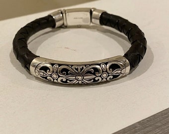 Braided  leather and silver bracelet.. …..8.5 inch length