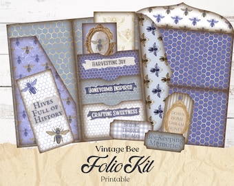 May include: A printable vintage bee folio kit with a blue and gold honeycomb pattern. The kit includes tags with text such as "Harvesting Joy", "Honeycomb Inspired", "Crafting Sweetness", "Buzzing Through the Ages", "Hives Full of History", "Down Home Graham Honey", and "Beekeeping Memories".