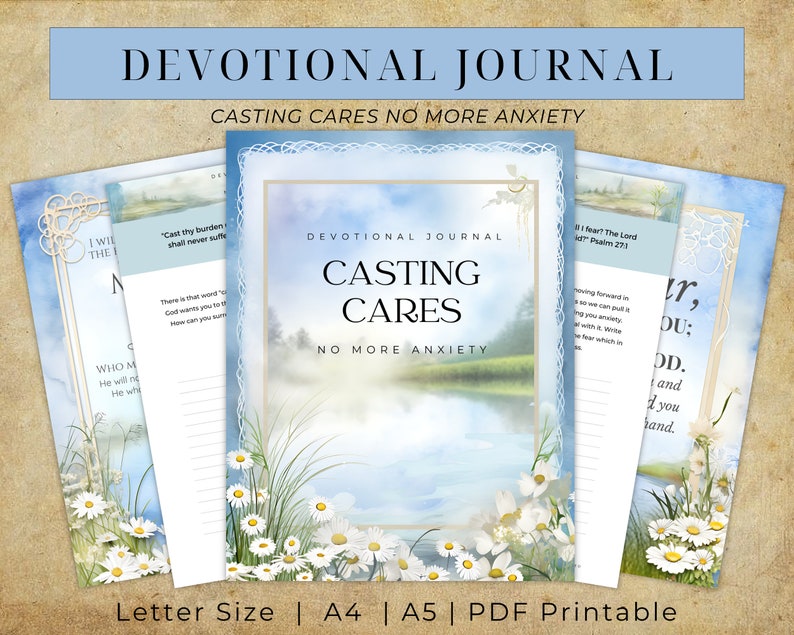 以下が含まれることがあります： 青と白の花柄のデザインの祈りのジャーナル。表紙には「Devotional Journal Casting Cares No More Anxiety」というテキストが書かれています。