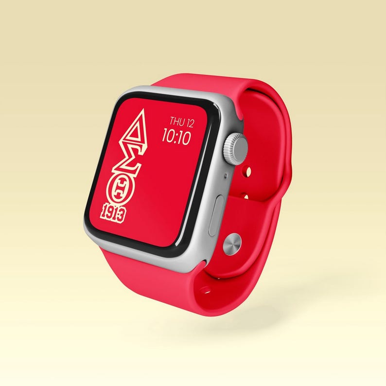 May include: A red Apple Watch with a white band and a white face. The face displays the date, time, and a white Greek letter logo with the text "1913".