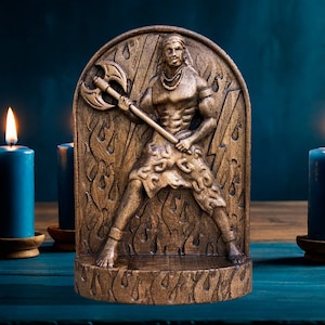 May include: A wooden sculpture of a warrior holding an axe. The sculpture is carved with intricate details and is set against a background of flames. The sculpture is displayed on a wooden base.