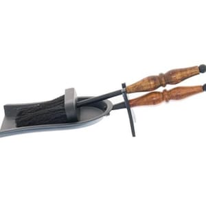 May include: Black metal fireplace set with a brush and two tools with wooden handles. The tools are attached to a metal holder.
