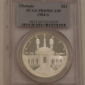 1984-S Summer OLYMPICS- SILVER Dollar Coin- 1 Ounce- PCGS Graded Commemorative - Los Angeles